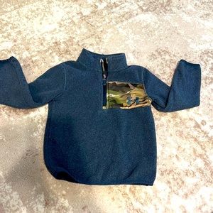 Under Armour,size 4, blue with camo pocket